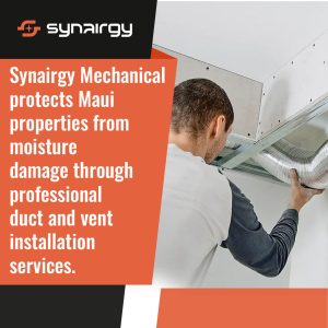 Technician installing insulated HVAC ductwork inside a residential ceiling to improve ventilation and prevent moisture buildup.