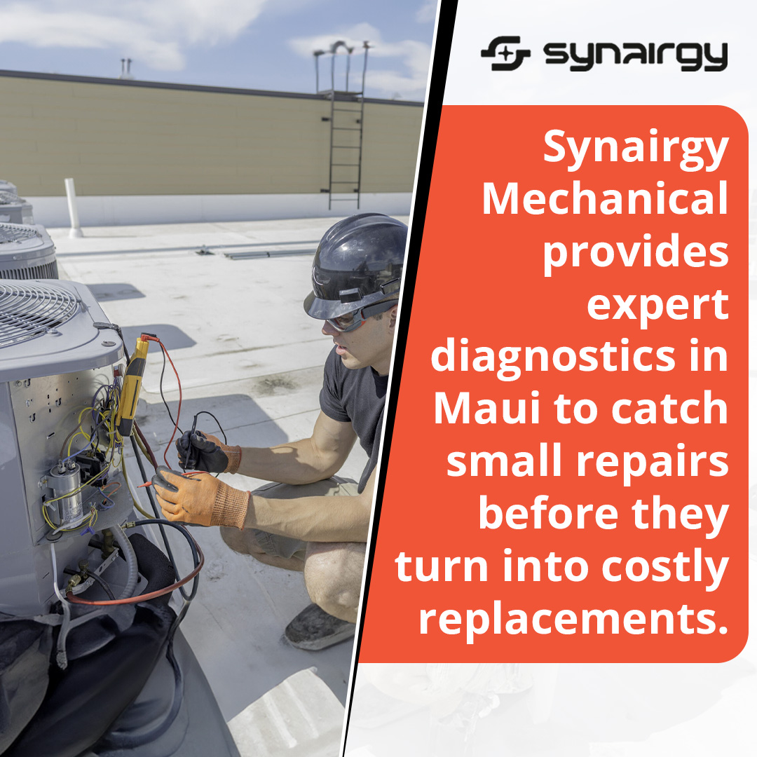 HVAC technician performing rooftop air conditioning maintenance and electrical diagnostics in Maui